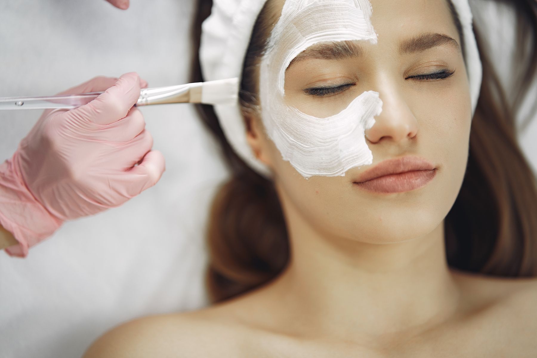 Professional facial mask applied with precision